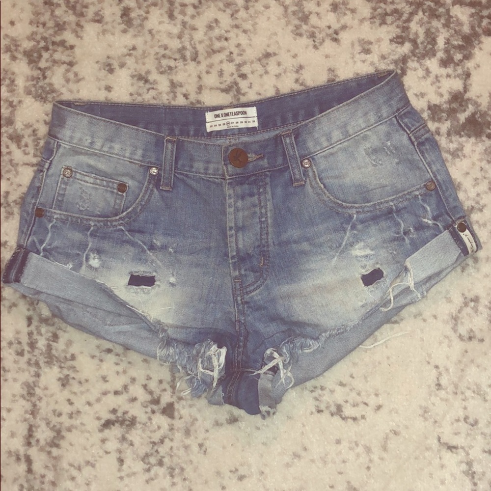 Distressed denim shorts